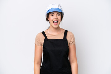 Fishmonger brazilian woman wearing an apron isolated on white background with surprise facial expression