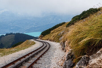 Cog railroad track to Schafberg peak. Salzburger land Alps mountains