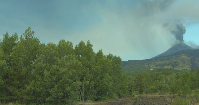 Daytime volcanic eruption with ash emission
