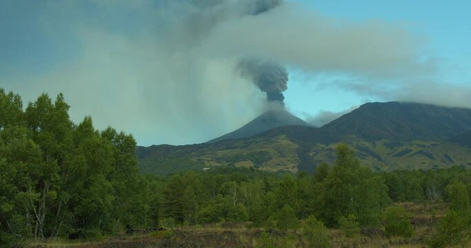 Etna volcano erupting, ash emitting from one of its summit craters: the southeast crater