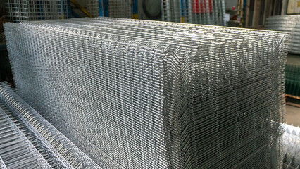 Obraz na płótnie Canvas Wire mesh steel for reinforcing concrete. stock photoThailand, Abstract, Architecture, Backgrounds, Building - Activity stock photo