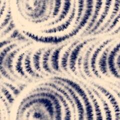 Seamless tie dye pattern in indigo and beige colors with blurred waves. Psychedelic hippie texture. Wavy 70s style design motif