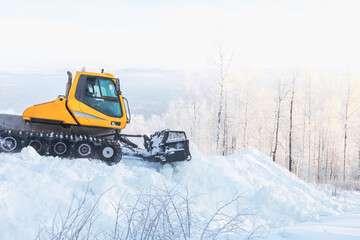 tractor for leveling snow on the skiing track