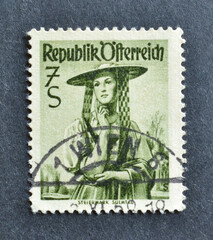 Cancelled postage stamp printed by Austria that shows Provincial Costume - Styria, Sulmtal, circa 1952.