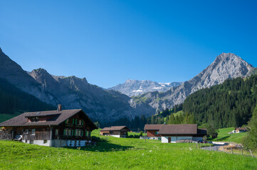 Fototapeta na wymiar View of Engstligenalp from the Engstligengrat hiking trail, Swiss Alps, Switzerland