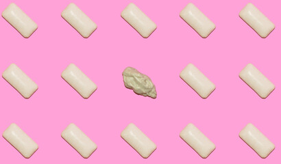 pattern made of chewing gum, freshness in the mouth, pink background
