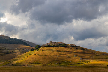 Dramatic mountain landscape near Castelluccio village in National Park Monte Sibillini, Umbria region, Italy