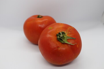 organic tomatoes on white background