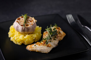 cod fillet with couscous and roasted garlic