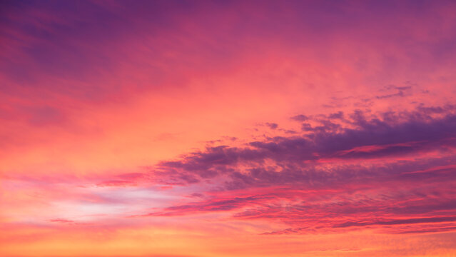 Sky with clouds during sunset. Clouds and blue sky. A high-resolution photograph. Panoramic photo for design and background.