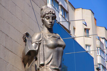 Moldova. Kishinev. 08.27.22. Sculptures on a building in the city in the center of the capital.