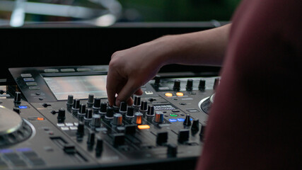 Dj mixing on a deck