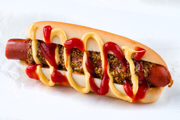 hot dog with sausage, ketchup and sauce