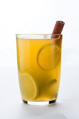 Christmas or New Year hot winter drink, spicy grog cocktail, punch or mulled wine with tea, lemon, cinnamon.