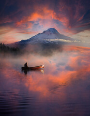 Sunset over Trillium Lake with canoe and Mt Hood with reflection, near Government camp oregon