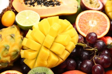 Many different delicious exotic fruits as background, closeup