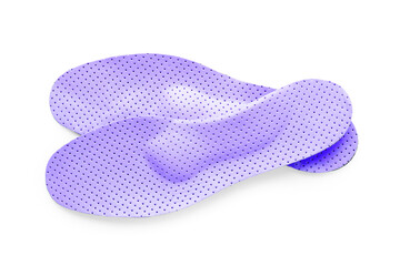 Pair of color orthopedic insoles on white background, top view