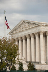 US Supreme Court Columns and American Flag