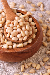 Pine nuts on the wooden table. Healthy food. 