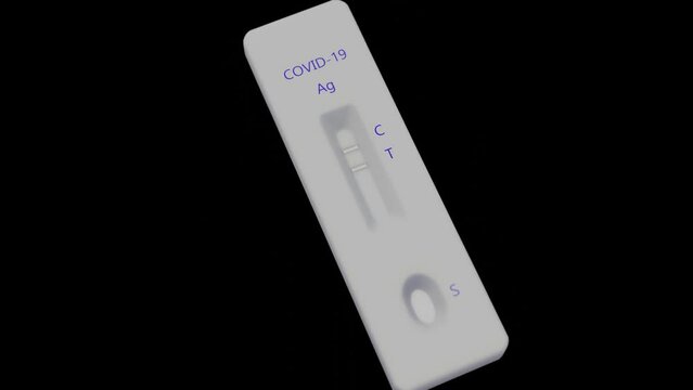 Antigen test kit with positive result.