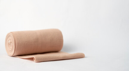 medical bandage roll on white selective focus
