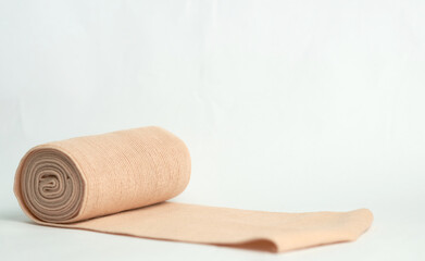 medical bandage roll on white selective focus