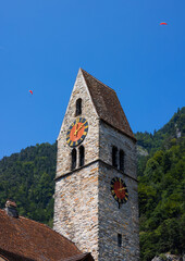 Fototapeta premium Historic christian stone church and bell tower in Interlaken, Switzerland
