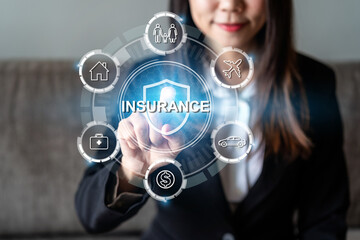 Businesswoman with virtual screen of  insurance protection for house, car, life, family, travel and health, Insurance concept