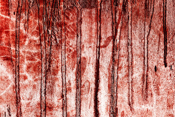 Red Background. scary bloody dirty walls for the background. walls are full of blood stains and scratches.