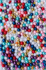 colorful beads on a white background