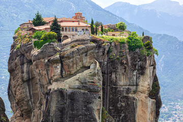 Fototapeta na wymiar Meteora, Greece - an Eastern Orthodox monastery built on a rock and included in the list of world cultural heritage.