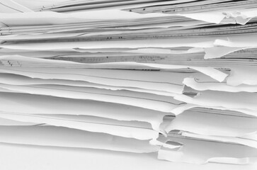 background with scattered overlay of crumpled papers.	