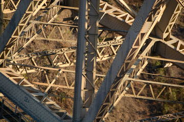 Close-up of steel structure of the Victoria Falls Railway Bridge - obrazy, fototapety, plakaty