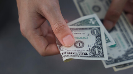 Young man  with dollar banknote which he is show of money and exchanging money while could be used for anything from business image