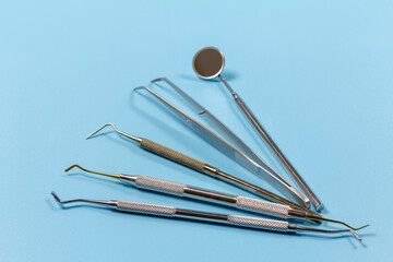 Set of metal dental instruments for teeth dental care