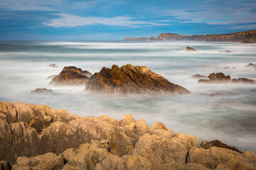 Cantabrian coast; long exposure image of the rocky coastline in the vicinity of the village of Liencres, Cantabria Spain