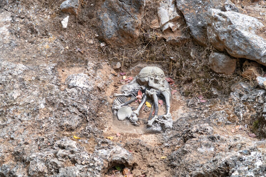 Exposition showing the burial of a caveman near the cave in which the caveman lived in a national reserve - Nahal Mearot Nature Preserve, near Haifa, in northern Israel