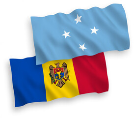 National vector fabric wave flags of Federated States of Micronesia and Moldova isolated on white background. 1 to 2 proportion.