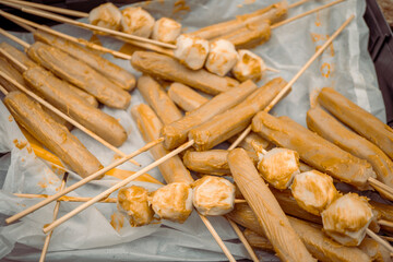 Close up photo of sausage barbeque when summer time holiday. The photo is perfect for family holidays poster, holiday background and food advertising.   