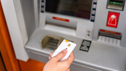 Atm cash machine. Money bank credit card holding hand. Withdraw money cash from atm. Money dollar, bank credit card.