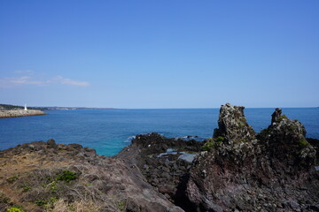 clear rock coast and lighthouse