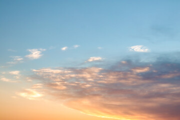 sunset orange clouds in blue sky