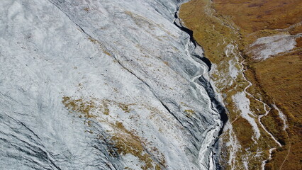 Picturesque mountain meadows gorge view of the Yarloo valley and dried riverbed aerial stock photography. Altai Mountains