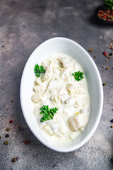 herring fish sour cream white sauce fresh meal food snack on the table copy space food background