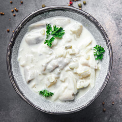 herring fish sour cream white sauce fresh meal food snack on the table copy space food background