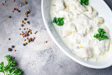 herring fish sour cream white sauce fresh meal food snack on the table copy space food background