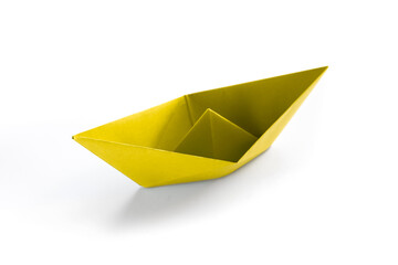 Yellow paper boat origami isolated on a white background