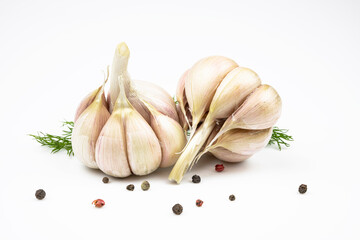 Garlic, pepper mixture, fresh herbs isolated on a white background.