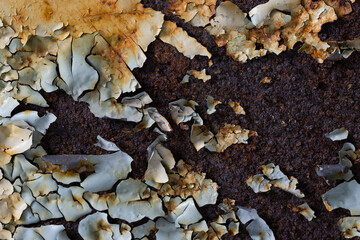 Texture of rusty metal with peeling paint. Rough metal surface with rust. Corroded and oxidized old iron. Rusted and aged metal sheet. Great for background and design in grunge style. High resolution.