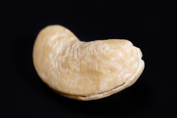raw cashew nut on black background